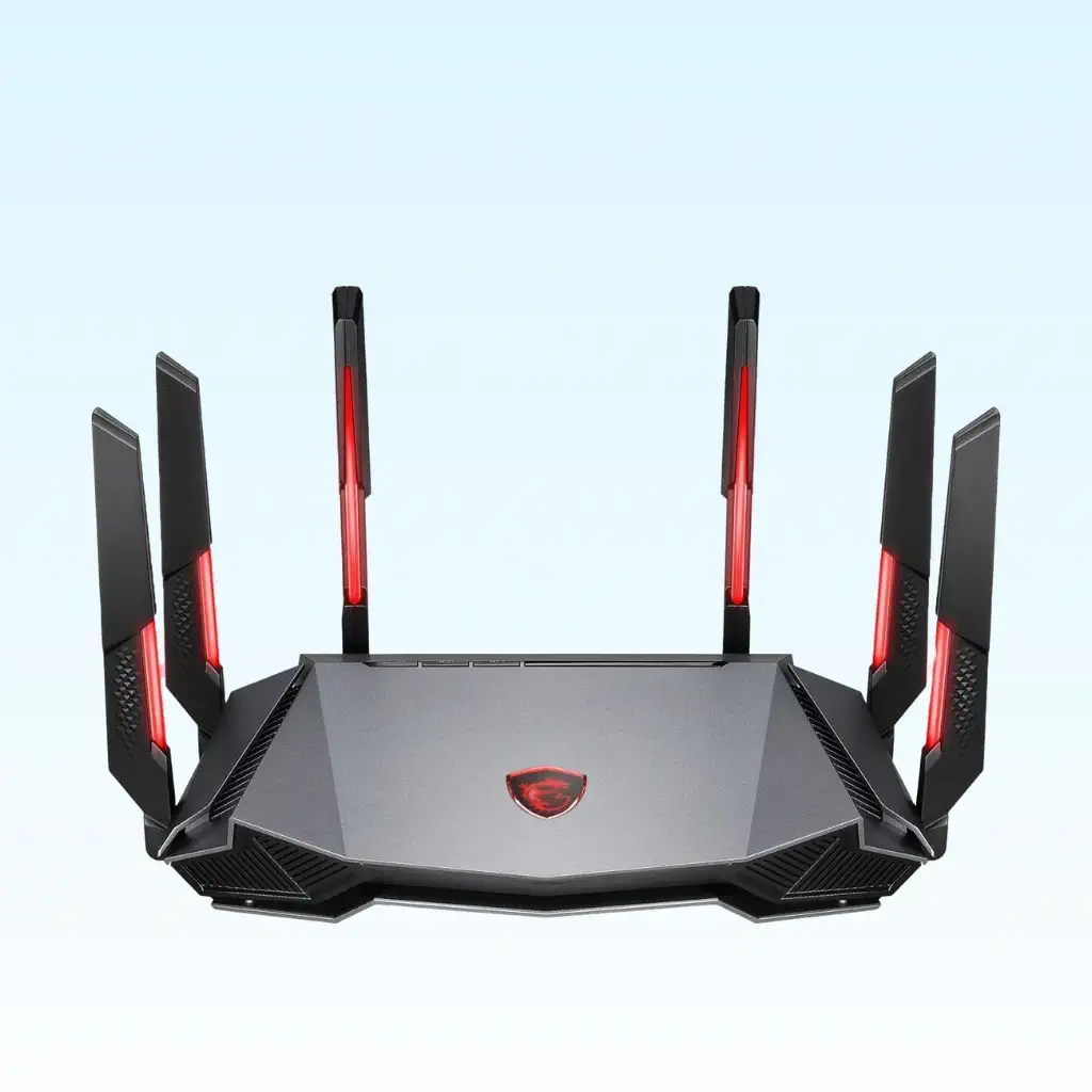 A gray and black MSI RadiX AXE6600 gaming router with eight external antennas and red accents, set against a light blue background
